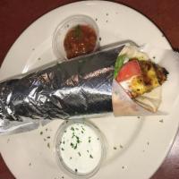Shish Tawook Sandwich · Tender marinated chicken breast charbroiled. Served on a warm pita with lettuce, tomatoes an...