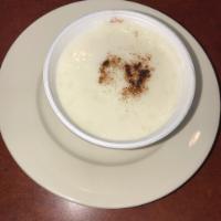 Rice Pudding · Milk, rice and sugar make a wonderful sweet and creamy dessert topped with cinnamon flavor.