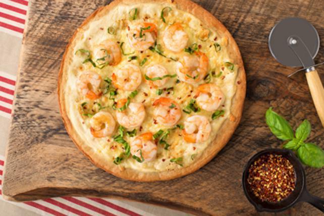 SEAFOOD ALFREDO PIZZA · Shrimp, crab meat, onions And tomatoes . Alfredo sauce with extra cheese