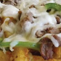 Cheesesteak Fries · fries topped with steak meat, onions, green peppers and mozzarella cheese