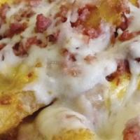 Bacon Cheese Fries · fries topped with pizza cheese, cheddar cheese and bacon