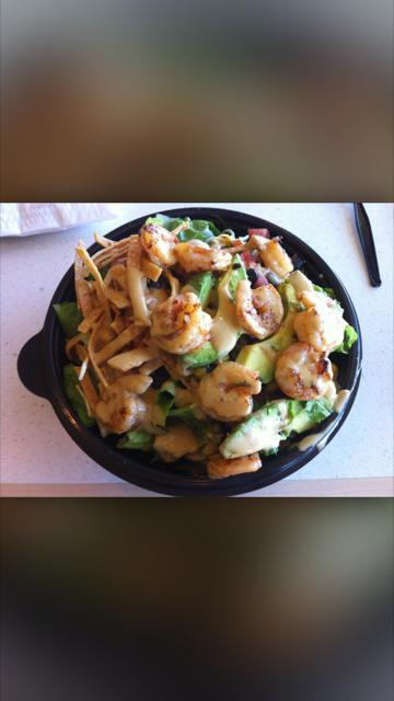 Chipotle Shrimp Salad · Grilled shrimp, romaine, avocado, beans and corn mix, salsa Mexicana, cheese, tortilla strips and chipotle dressing.