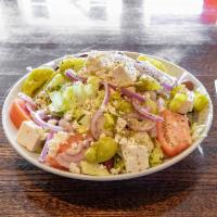 Greek Salad · Lettuce, cucumbers, tomatoes, onions, Kalamata olives, peperoncino, and feta cheese. Topped ...