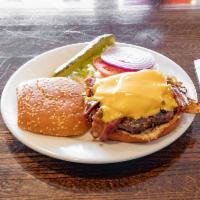Bacon Cheddar Burger · A juicy burger. Topped with cheddar cheese, crispy bacon, lettuce, tomato, and onion. Served...