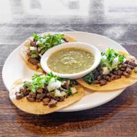 Mexican Style Taco · 3 tacos with cilantro, onion, and your choice of meat. Served on corn or flour tortillas. Ad...