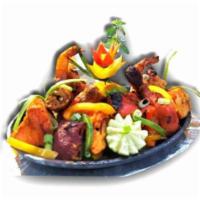 Mixed Tandoori Grill · An assortment of tandoori specialties (tandoori chicken, chicken tikka, seekh kabob, lamb ti...