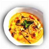Navratan Korma · Mixed vegetables sauteed in cream, herbs and spices.