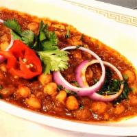 Channa Masala · Garbanzo beans cooked in special blend of spices.