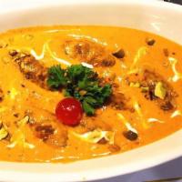 Malai Kofta · Fresh grated vegetable fritters cooked in a tomato, cream and onion sauce.