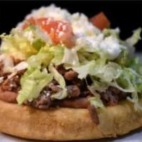 Sope Lunch · Beans, lettuce, onion, tomato, sour cream, and cheese.
