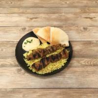 Lamb Kabob Dinner · Tender cubes of lamb, marinated and grilled over an open flame.