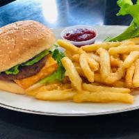 Nica Burger · Our Nicaraguan Burger with Fried Cheese.