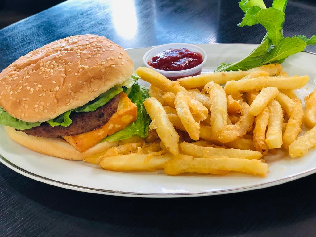 Nica Burger · Our Nicaraguan Burger with Fried Cheese.
