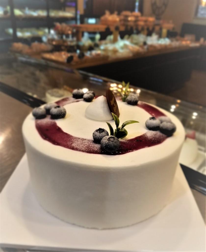 Blue Berry Fresh Cream Cake · A vanilla sponge cake filled with fresh cream and a layer of blueberry jam.