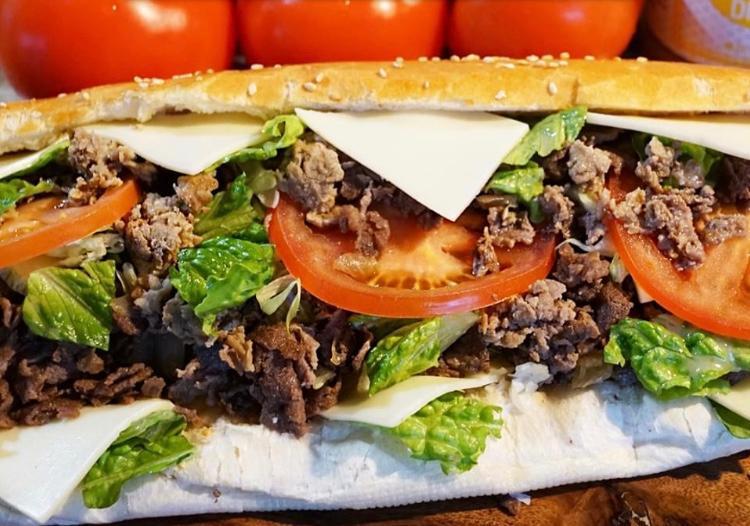 Loaded Steak N Cheese  · Steak, cheese, pizza sauce, mushrooms, green peppers, onions, lettuce, tomatoes and Tubby's famous dressing.