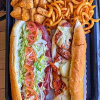 Chicken Parmesan Sub · Chicken tenders, pizza sauce, melted cheese and Parmesan cheese.