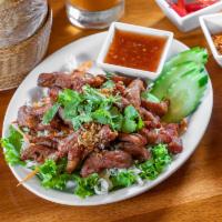 6. Pork Jerky · Thai style marinated pork or beef deep-fried.
