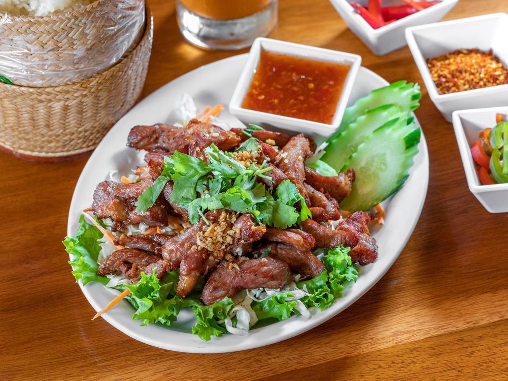 6. Pork Jerky · Thai style marinated pork or beef deep-fried.