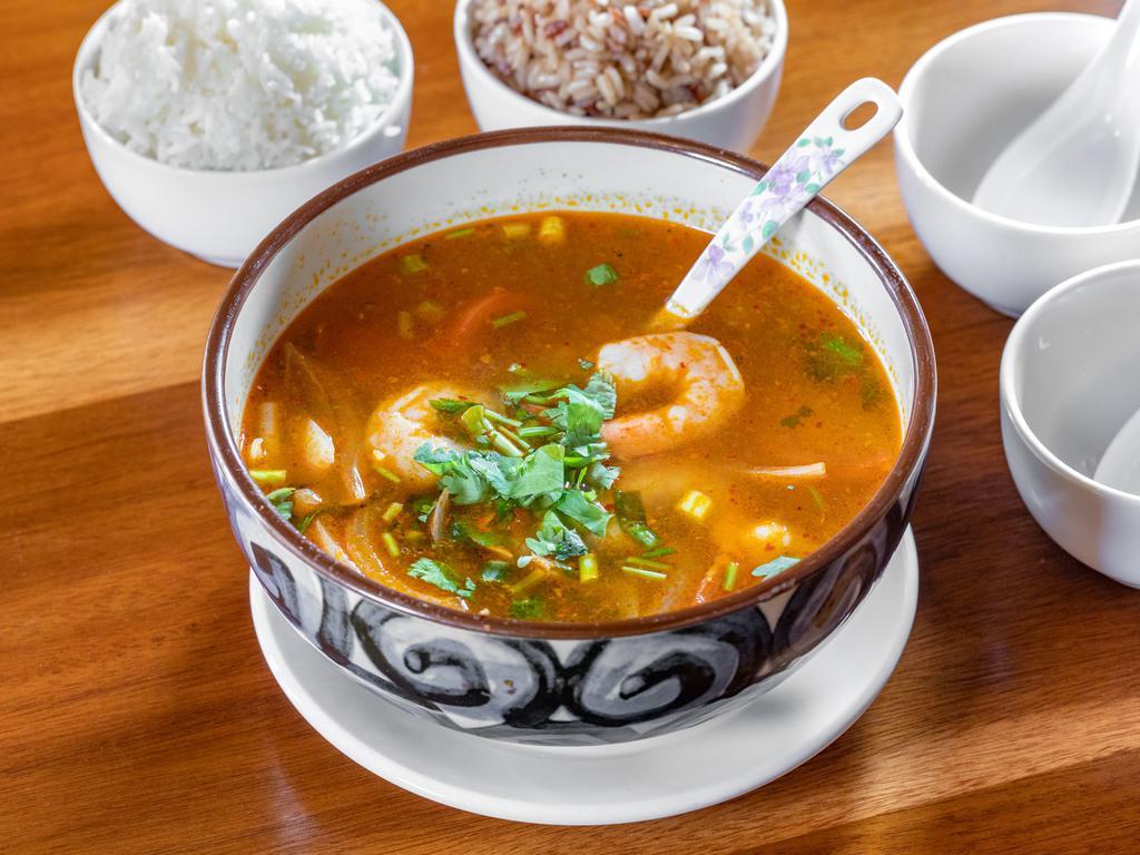 21. Tom Yum · Thailand's most famous soup. a spy class brother containing tomatoes, onion, mushrooms, lemongrass, kafir lime leaves, and traditional spices. Prepared mild, medium, or spy.