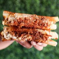 BBQ Pork Cheese Melt · Smoked BBQ pork, BBQ sauce, havarti cheese, muenster cheese, and cheddar cheese, on grilled ...