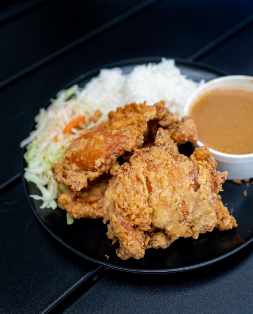 Fried Chicken and Gravy Rice Plate · Buttermilk fried chicken, mushroom gravy, steamed rice, tossed green salad.