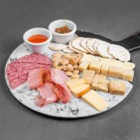 Charcuterie and Cheese Plate · Cheese selection, prosciutto, salami, fig jam, crackers, mike's hot honey, candied walnuts 