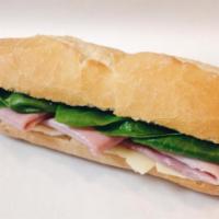 Parisien Sandwich · Choice of Emmental cheese or Brie cheese, ham, butter and baby greens on a French baguette.