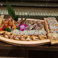 Sushi Dinner · 8 pieces nigiri chefs choice and 1 tune roll. Raw.