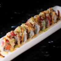 Angel Roll (8pcs) · Spicy tuna topped with tuna, shrimp, avocado, tempura flakes, wasabi tobiko. Raw.