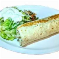 Burrito  · Meat of your choice with beans, rice pico de gallo served with a salad carne de su gusto con...