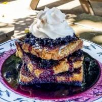 Sweet Leilani Blueberry French Toast · Graham cracker crusted and layered with blueberries drizzled with cheesecake frosting.