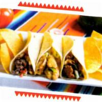 Tacos 3 Amigos · Served with chips.