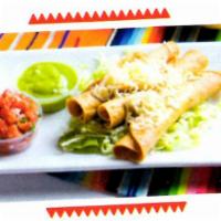 Roll Taquito · Beef only. Served with pico de gallo, lettuce, guacamole, cheese and sour cream.
