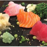 Sashimi Sampler · 2 pieces Tuna, 2 pieces salmon and 2 pieces yellowtail.