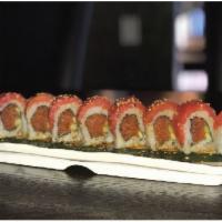 8 Piece In and Out Roll · Inside: Spicy tuna and cucumber. Topped with tuna and served with ponzu sauce.