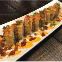 Philly Deep Roll · Deep battered fried Philadelphia roll served with Khanya sauce and spicy mayo sprinkled masa...
