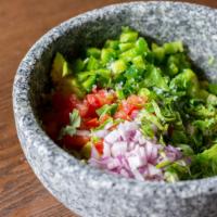 Guacamole · Fresh Avocados, tomato, red onions, cilantro and lime Juice served with yellow corn chips