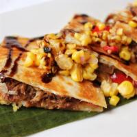 Quesadillas De Pato · Slowly Braised Duck and Gouda Cheese Quesadillas topped with Pomegranate Glaze