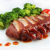 Tamarind Duck · Crispy boneless roasted duck with pineapple, red pepper and green pepper in tamarin sauce. S...
