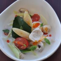 Coconut Chicken Soup (Tom Kha Gai) · Chicken, mushroom, tomato, coconut milk, cilantro and galangal broth.