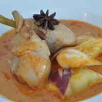 Massamun Curry · Potato, onions, carrot, peanut, Massaman curry paste. Spicy.