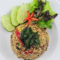 Spicy Basil Fried Rice · Fried rice with a choice of meat with basil leaf, green and red pepper, onions and garlic. H...