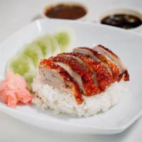 Roast Duck on Rice · Roast duck on rice with Chinese broccoli and pickled ginger with special sauce.