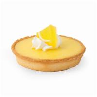 Lemon Tart · The ultimate lemon tarts the mix flavored of sweet creamy lemon curd topped with moraine.