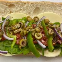 Veggie Sub  · Spinach, Green Peppers, Onions, Tomatoes, Green Olives, Provolone Cheese, Olive Oil - Served...