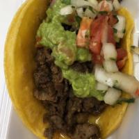 Carnitas Taco · Shredded pork, guacamole and pico de Gallo 