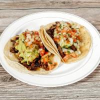 #8. Two Carne Asada Tacos Combo · Choice of meat steak, Carnitas, Alpastor or grilled chicken 