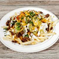 Carne Asada Fries  · French fries loaded with any choice of meat, guacamole sour cream and pico de Gallo and melt...