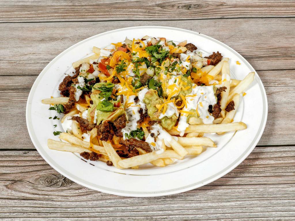 Carne Asada Fries  · French fries loaded with any choice of meat, guacamole sour cream and pico de Gallo and melted cheese 