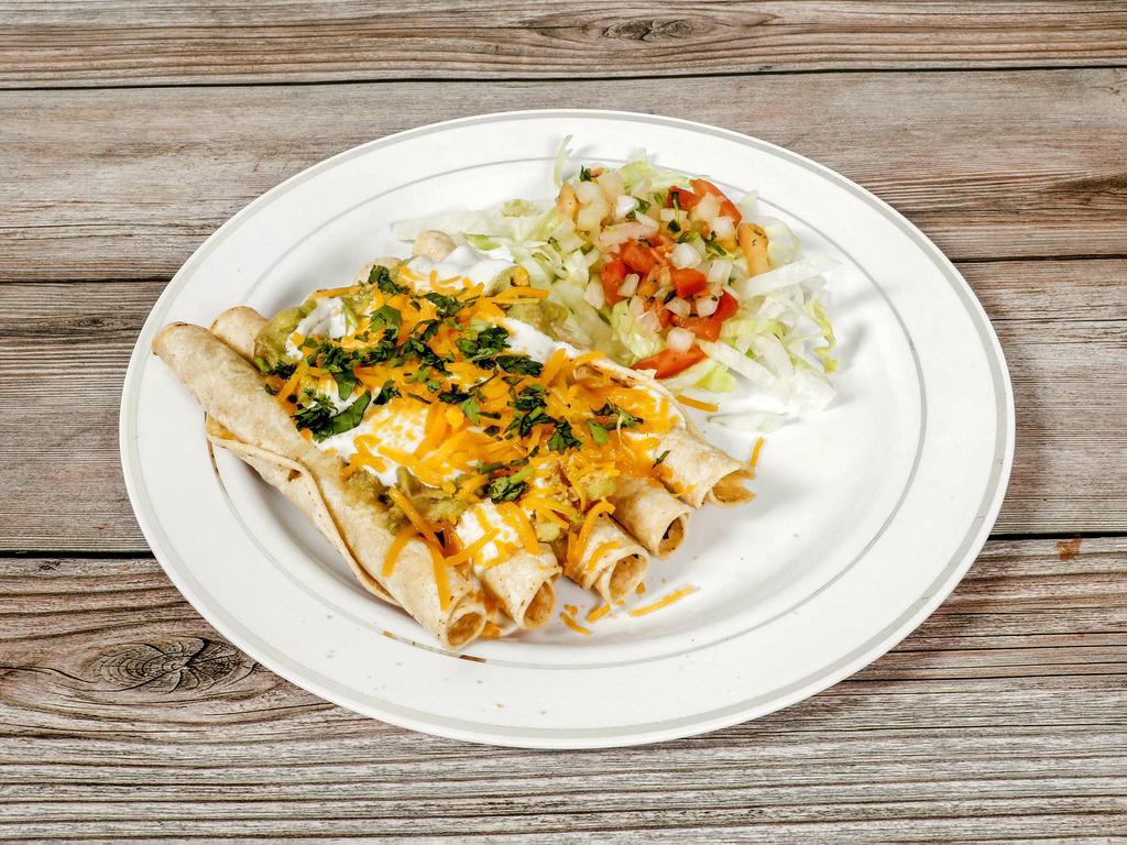 5 Roll taquitos  · Beef or chicken deep fried taquitos wit guacamole an melted cheese or sour cream and cheese lettuce and pico de Gallo on side 